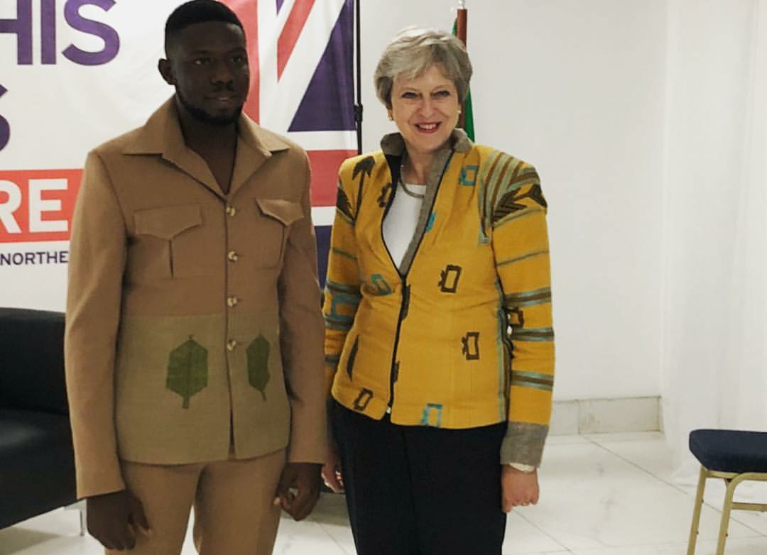 Meet Emmanuel Okoro who designed Theresa May’s jacket for her Nigerian visit