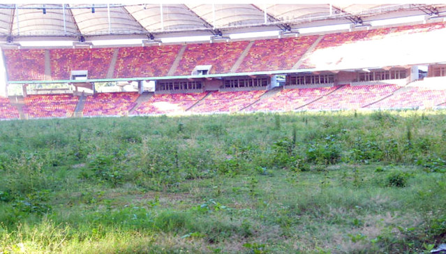 Nigerians react as Buhari names Abuja national stadium after Abiola