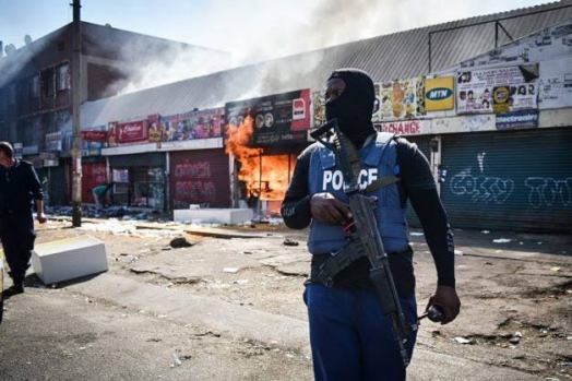 Foreign-owned businesses attacked in SA over taxi driver’s death Foreign-owned businesses attacked in SA over taxi driver’s death