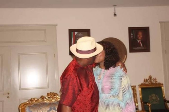 Wike celebrates victory at tribunal with a kiss with his wife