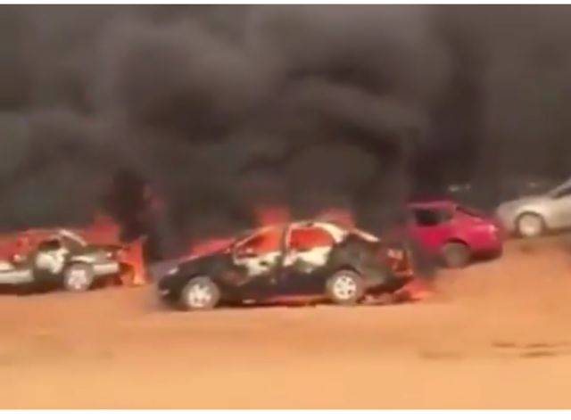 Video: Pro government thugs attack #EndSARS protesters in Abuja again, set their cars on fire