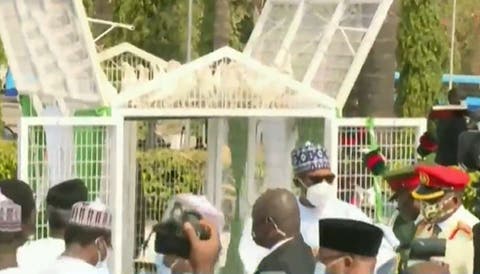 Pigeons released by Buhari refuse to fly at Armed Forces remembrance