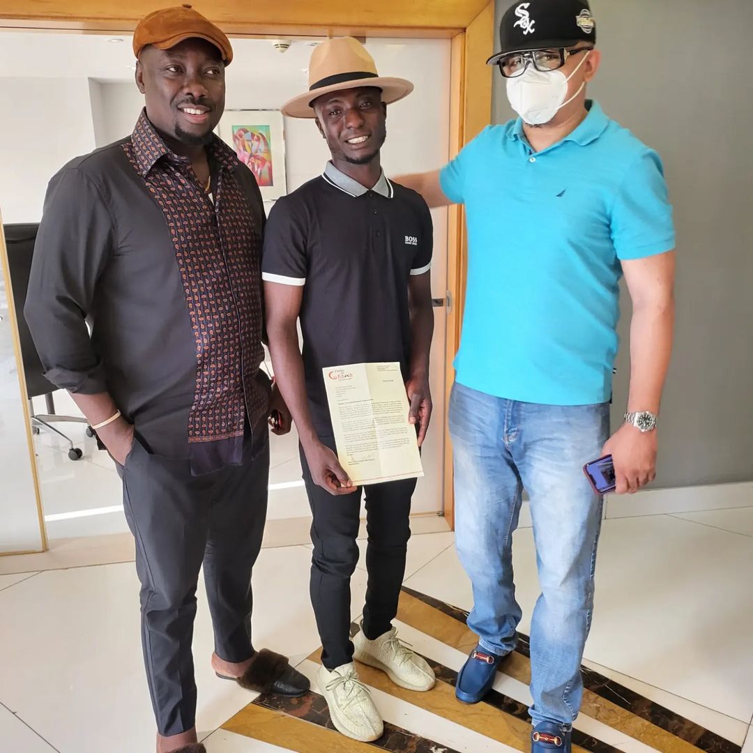 Obi Cubana meets with Lagos hawker gives him scholarship letter, places him on 100k salary