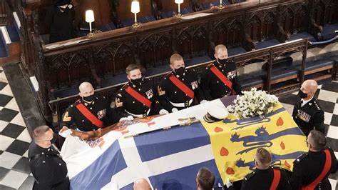 Queen Elizabeth II’s coffin lowered into Royal Vault